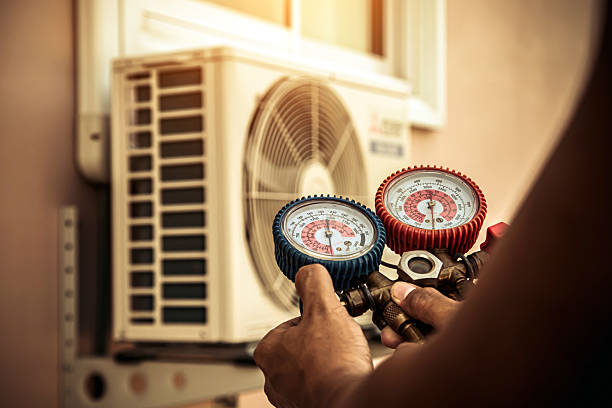 Professional Air Conditioning Service technician working in Brier Hill, PA